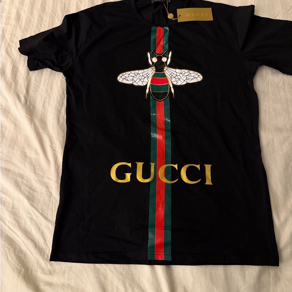 Gucci Black Tee with Gold Logo and Red-Green Stripe